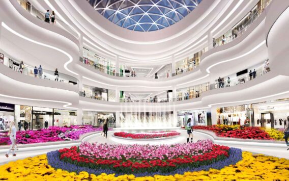 An interior court at American Dream showing a water feature and extensive floral display